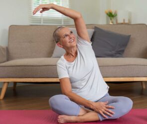 Woman Practicing Yoga at Home