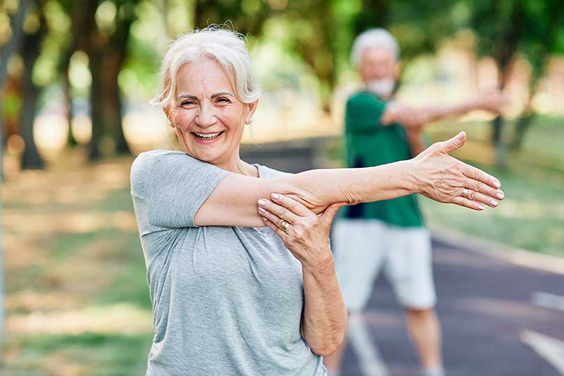 Elderly senior mature woman exercising